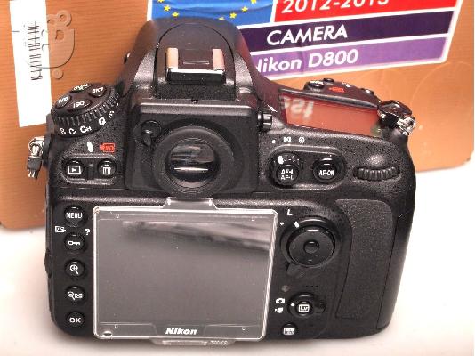 Nikon D800 36.3 MP Digital SLR Camera with lense.